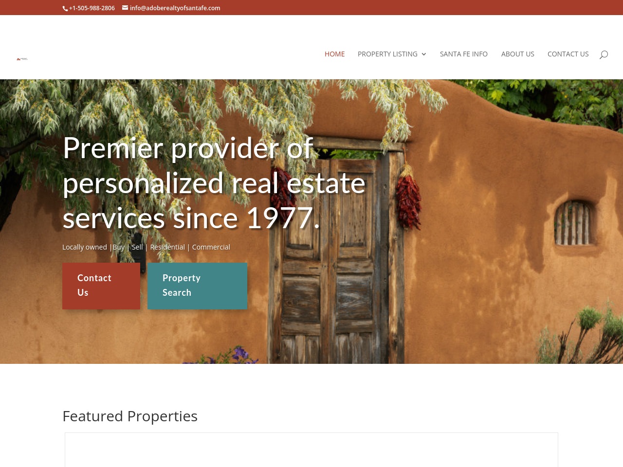 adoberealtyofsantafe.site screenshot alt-text